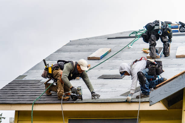 Professional Roofing technician working in Saunderstown, RI